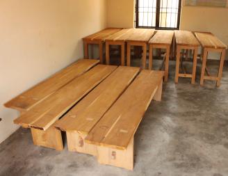 Set of desks and benches are needed.